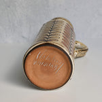 Bottom of a ceramic pitcher with 'Malarmey' signature on a gray background